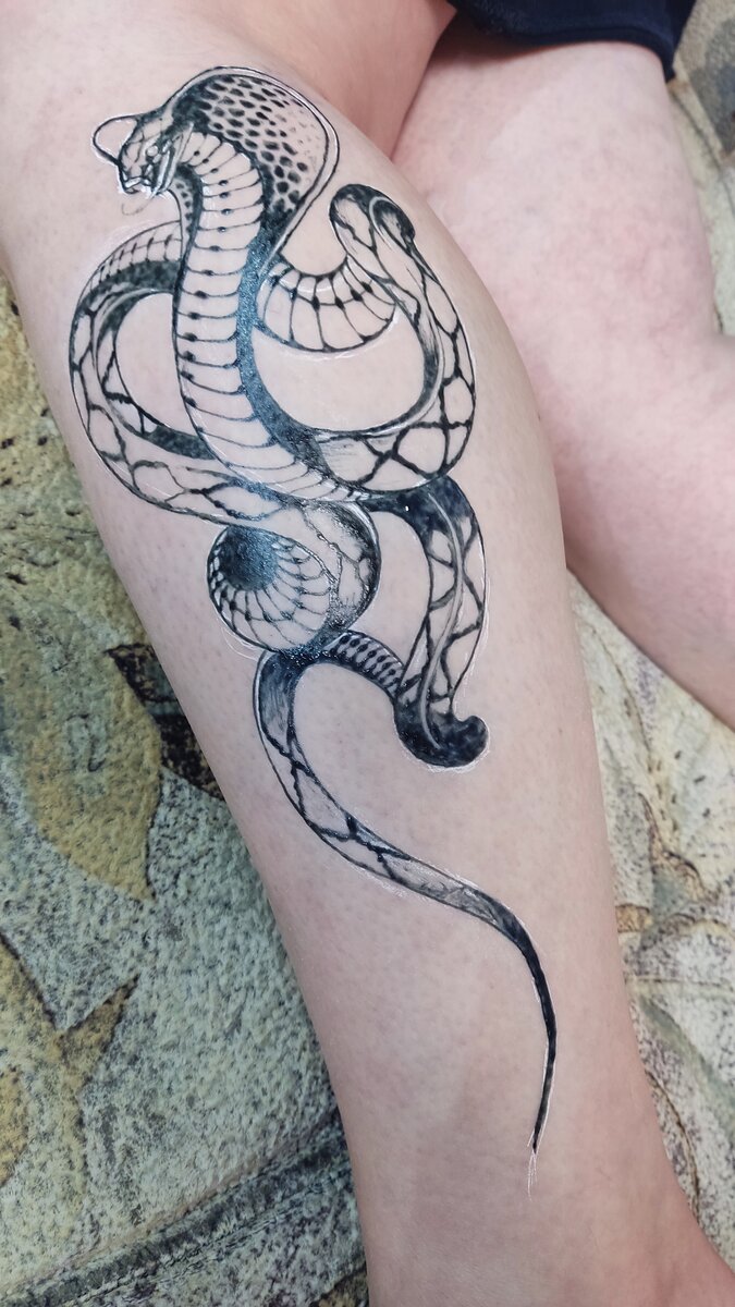 Значение татуировки кобра