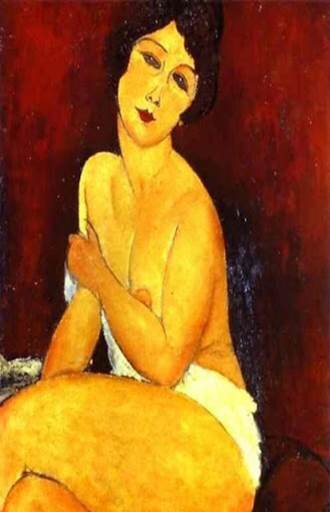 Обнажённая, сидящая на диване