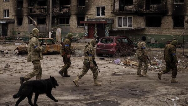    Украинские военные в городе Ирпень© AP Photo / Felipe Dana
