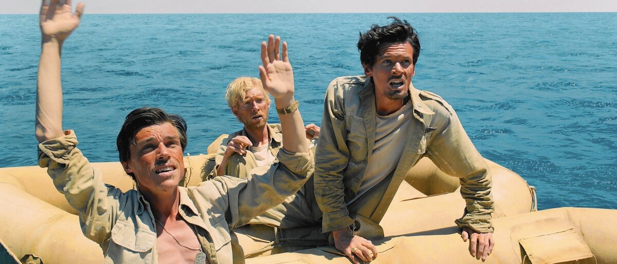 Кадры из фильма "Несломленный" снятого на истории Луи Замперини