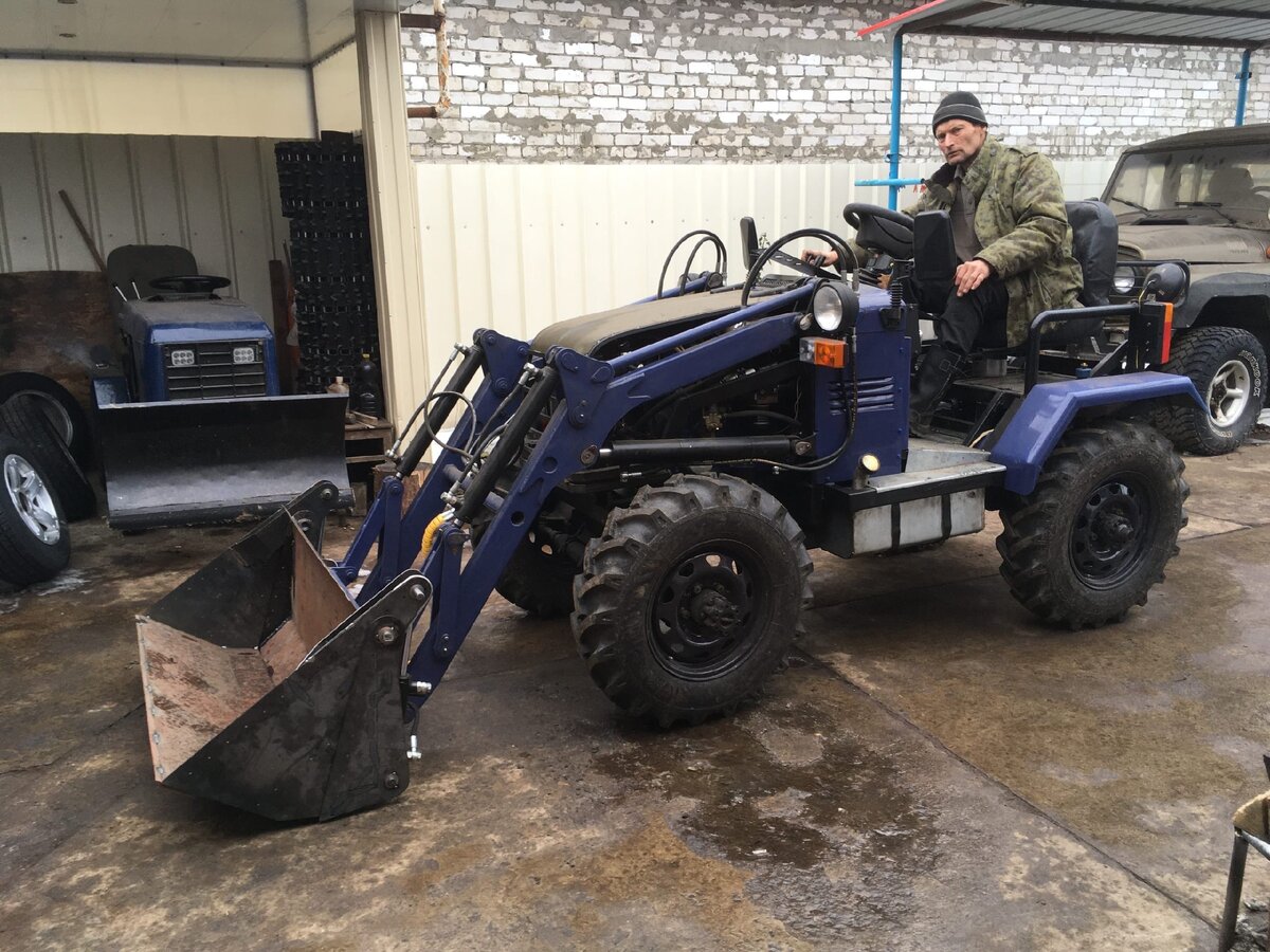 На данный момент выглядит так))) (и отец и трактор)