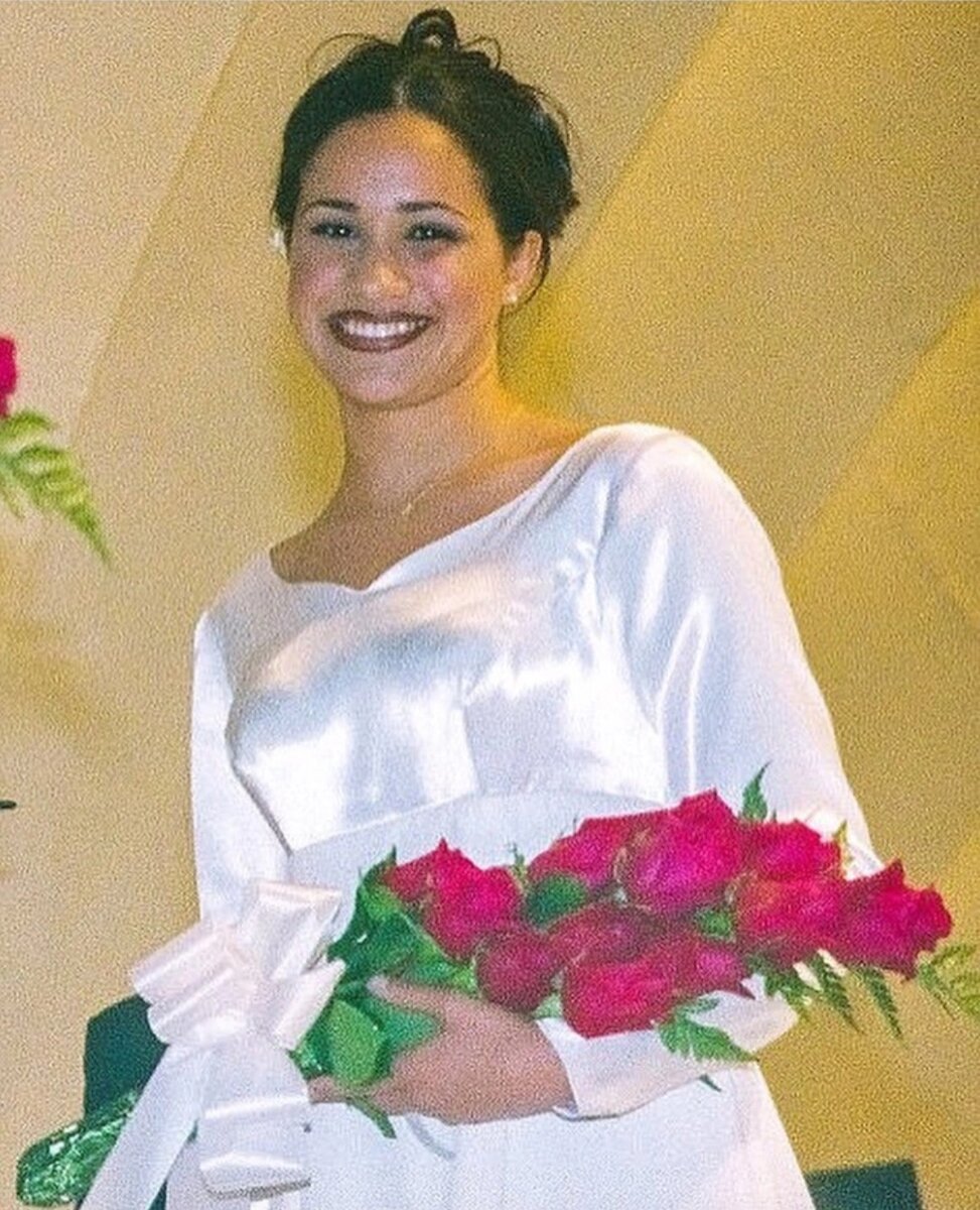 В белом, при параде.