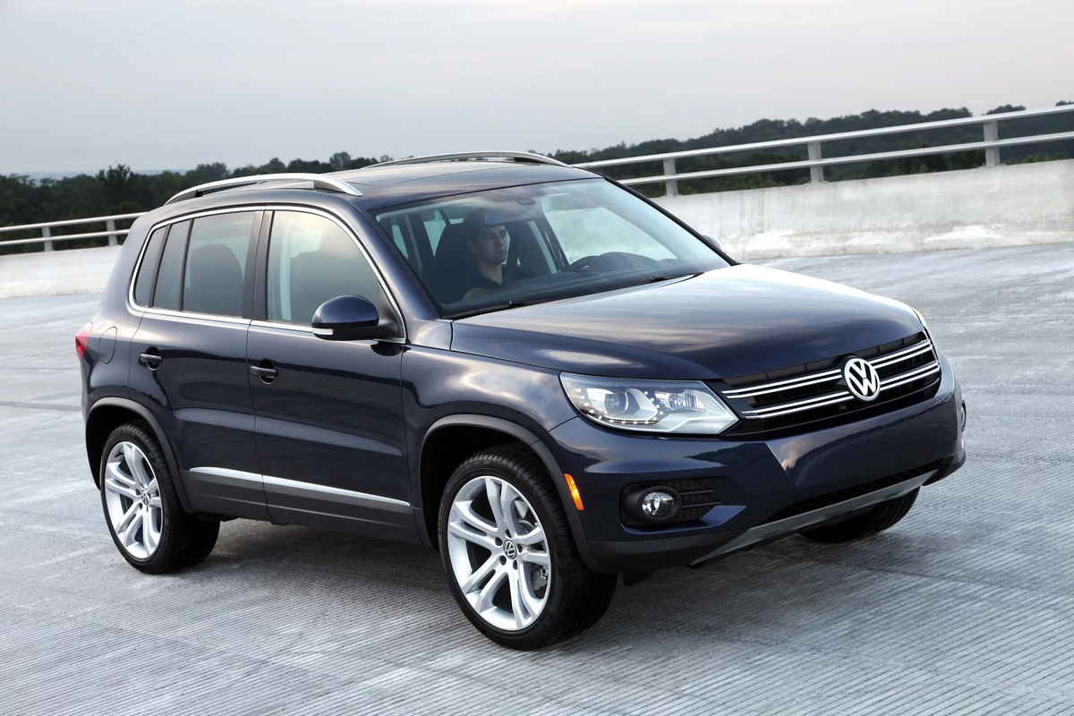 Volkswagen tiguan 2013. Фольксваген Тигуан 2015. VW Tiguan 2013. VW Tiguan 2012. Фольксваген Тигуан 2011.