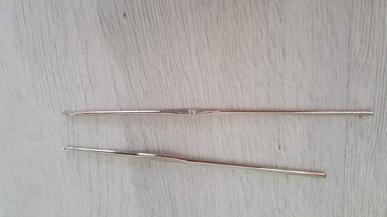 Вязальный крючок минимального размера.