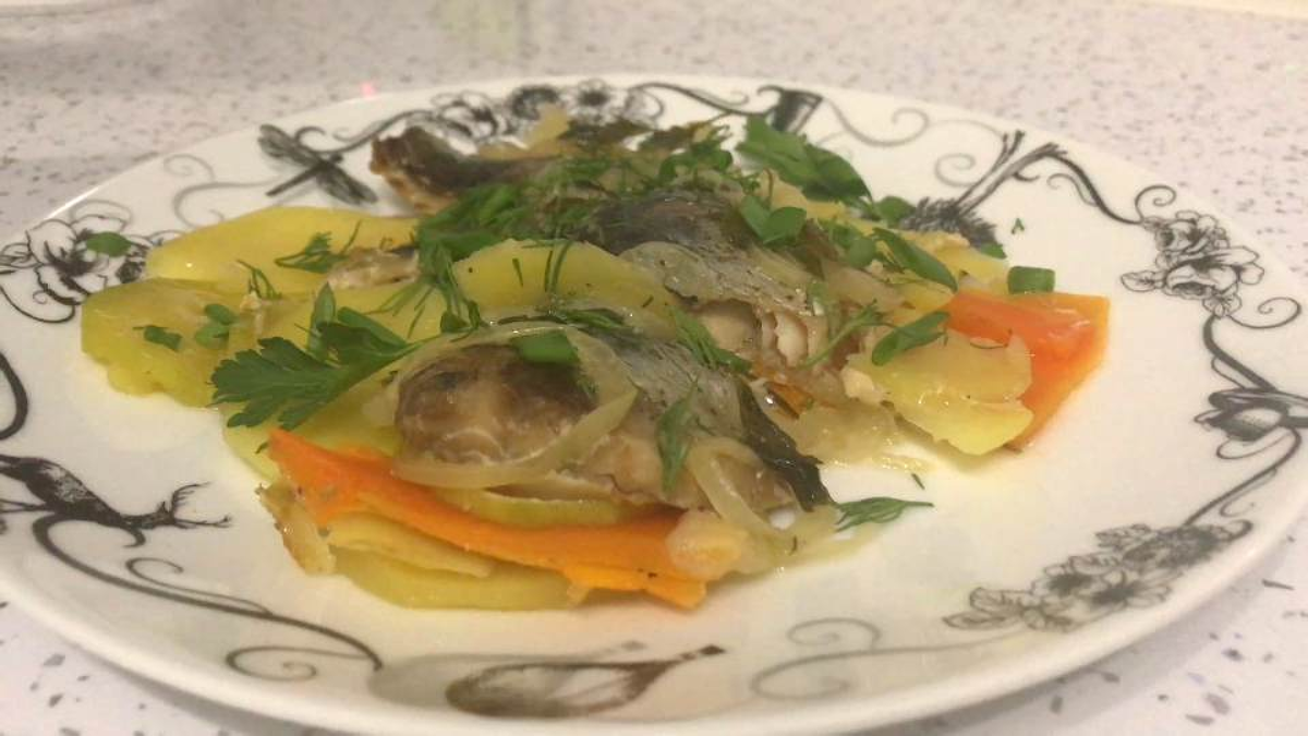 Oven baked mackerel on a vegetable pillow