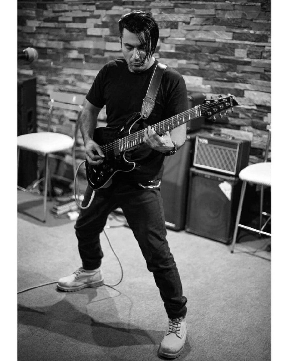 Reza Rostamian (vocals, guitars)