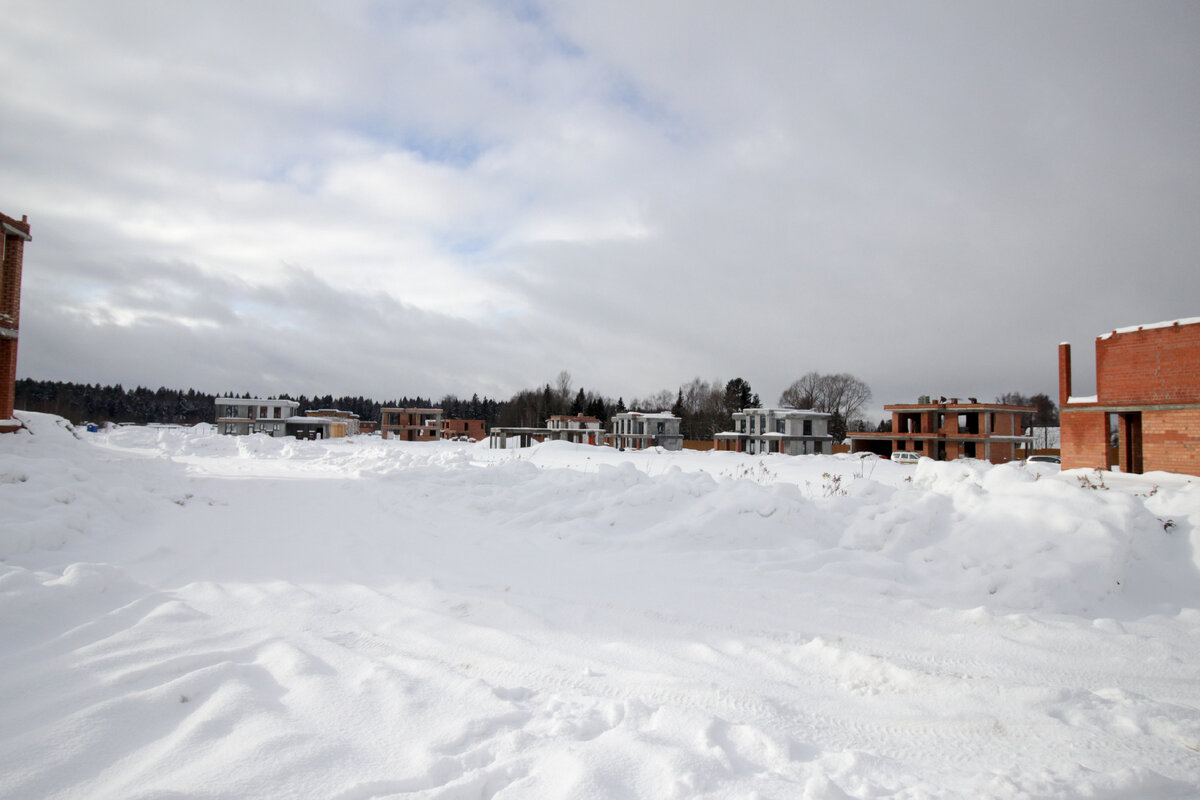 Фото архитектора Бориса Зайцева в поселке Райт Вилладж