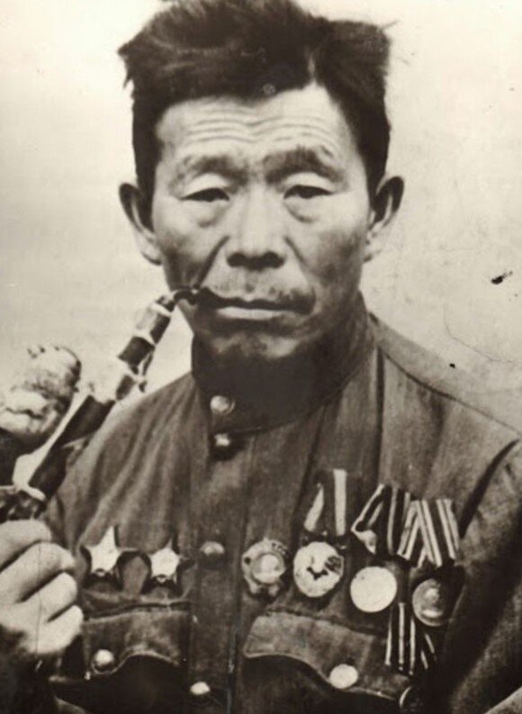 В годы Великой Отечественной войны рядовой Номоконов прошёл боевой путь от высот Валдая до Берлина. Воевал он под Старой Руссой, Киевом и Белой Церковью, в предгорьях Карпат, принимал участие в освобождении народов Румынии, Венгрии. 