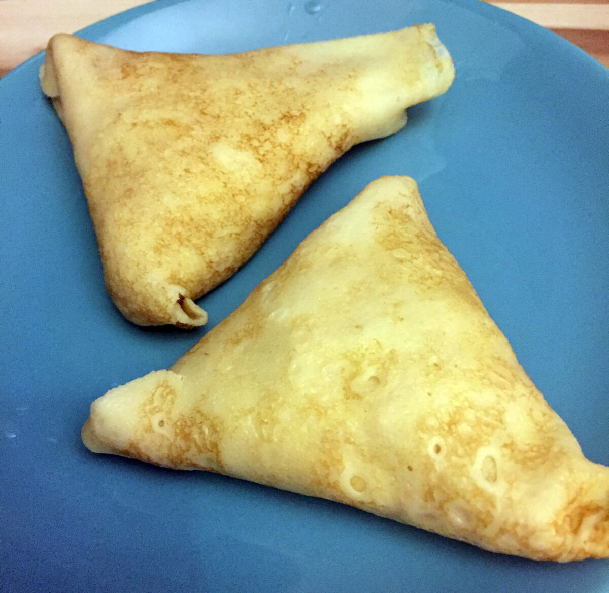 Треугольная форма блинов.