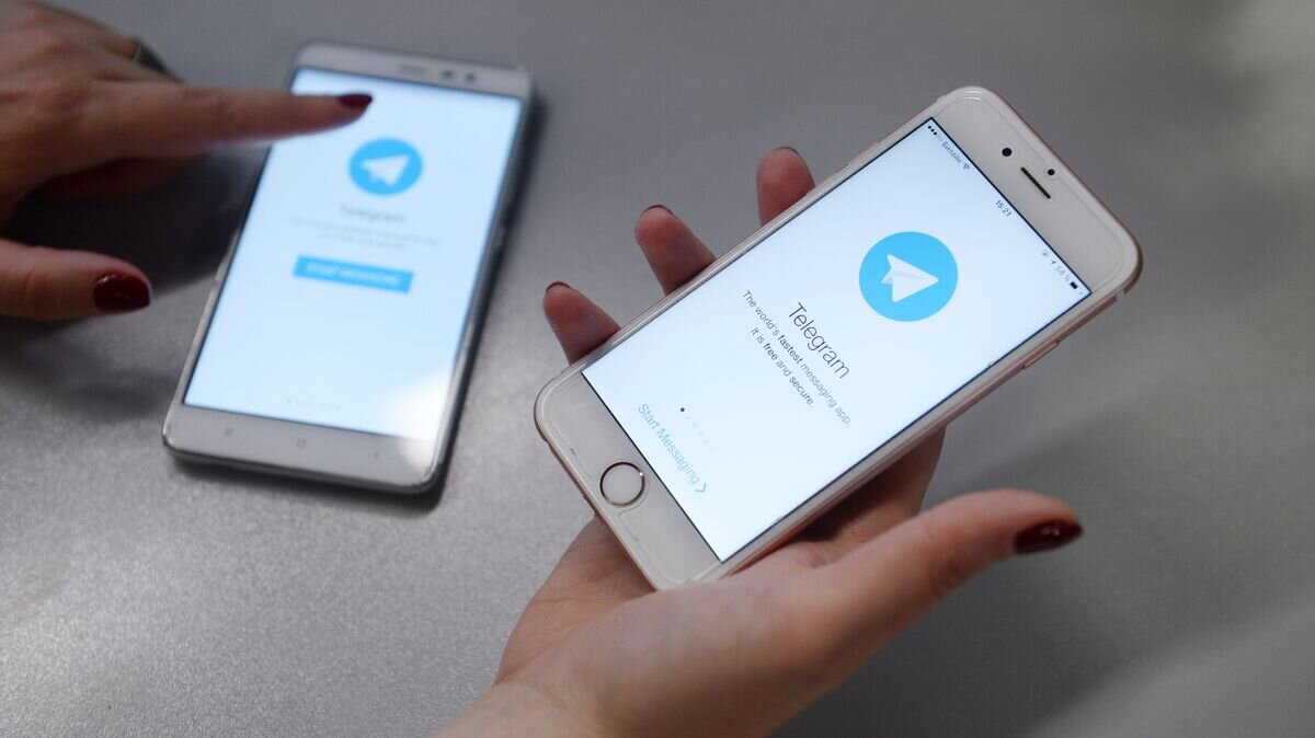    Мессенджер Telegram на экране телефона© РИА Новости / Кирилл Каллиников