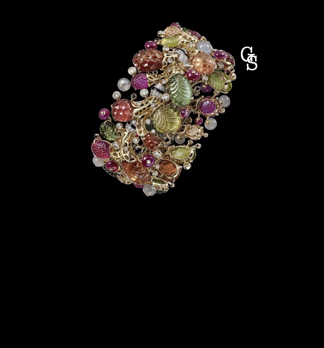 Браслет с резными драгоценными камнями от Cartier из коллекции "Tutti-Frutti".