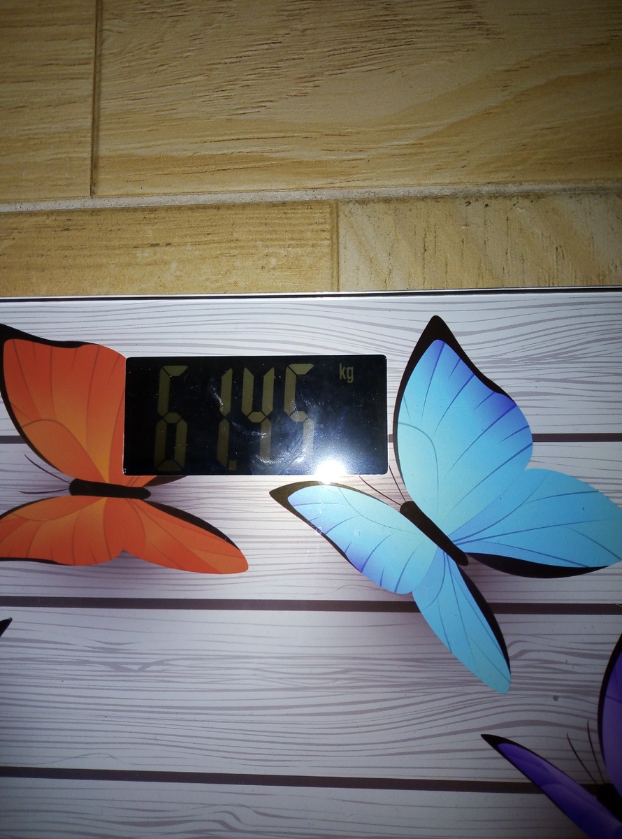 На весах 61.45 кг