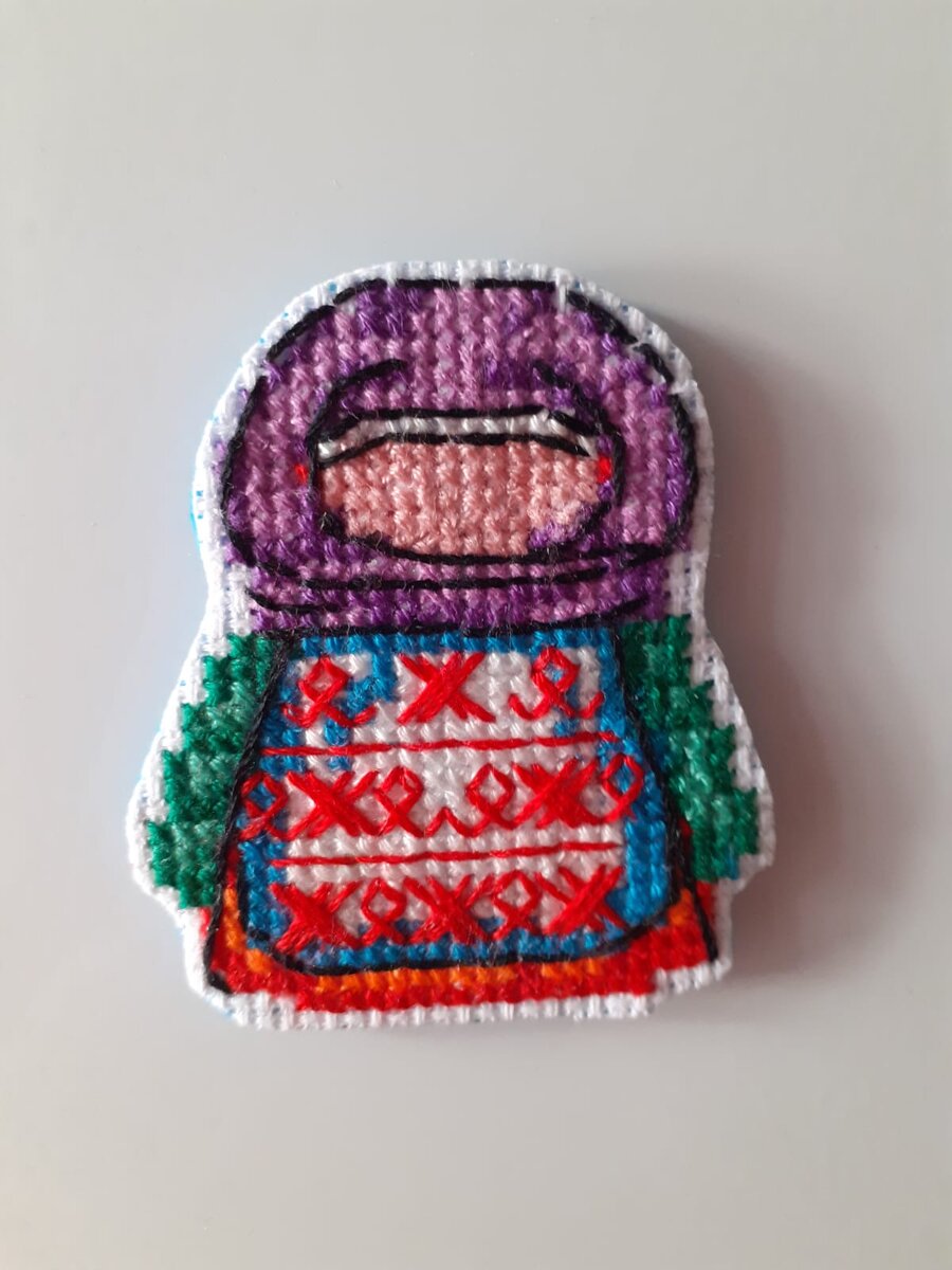 Крупеничка с обережной вышивкой на фартуке