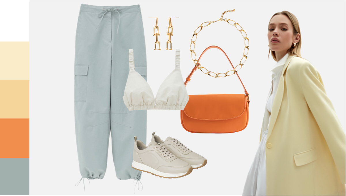 Образ в пастельных тонах с ярким акцентом в виде оранжевой сумки. Контраст спортивного и классического стиля поднимает образ на новый уровень! Обратите внимание на брюки-карго — тренд этого сезона. 