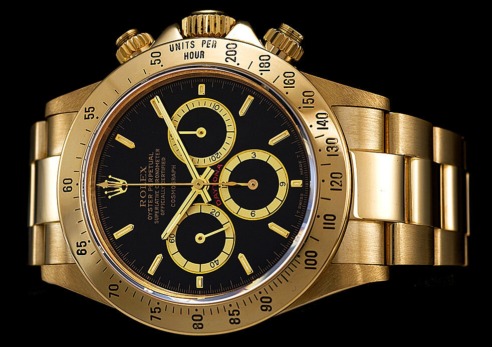 Роль часы. Часы ролекс Дайтона. Rolex Daytona золотые черный циферблат. Rolex Daytona Gold. Часы Rolex Daytona - ролекс Дайтона.