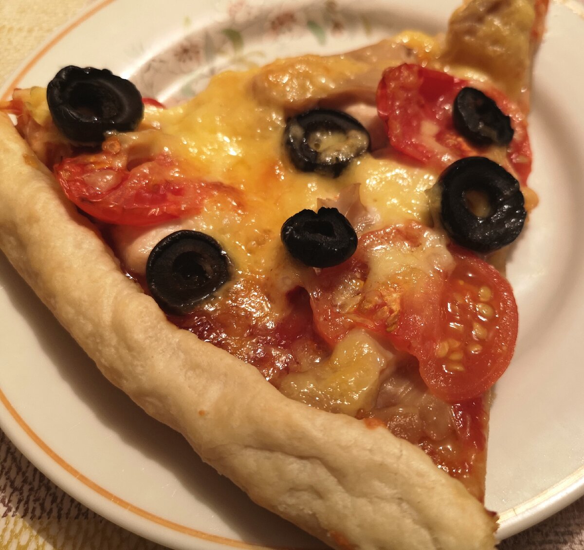 Тот самый кусок пиццы.