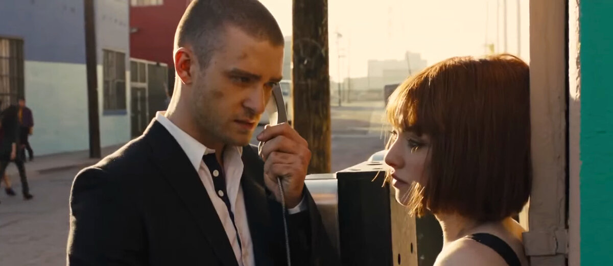 Джастин Тимберлейк и Аманда Сейфрид. Кадр из кинофильма "Время", 2011 г., режиссер и сценарист Эндрю Никкол, композитор Крэйг Армстронг (скриншот кадра для иллюстрации)