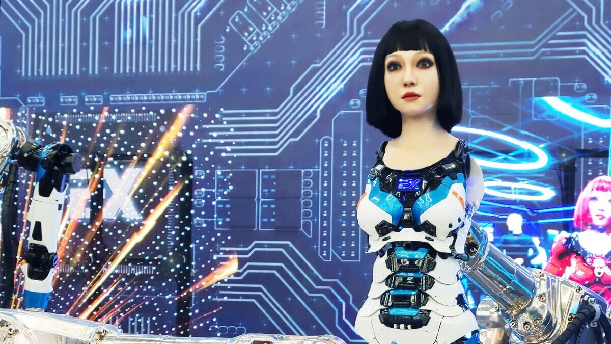    Робот на одном из стендов на Всемирной конференции робототехники в Пекине© РИА Новости / Анна Раткогло