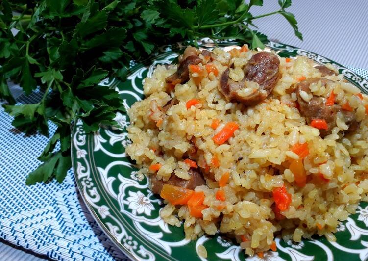 Плов из пшена с куриными сердечками