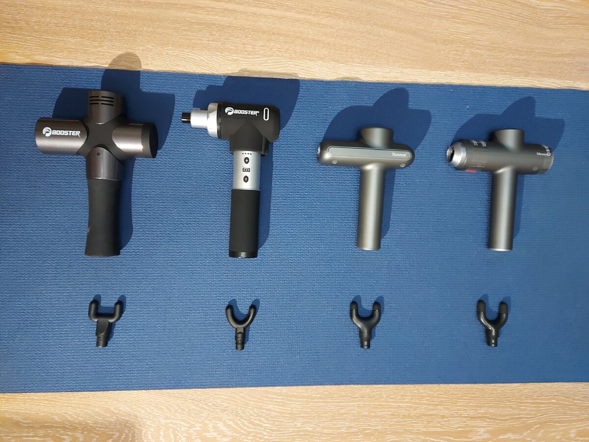 Насадка в форме вилки на массажер Booster Pro 3 (1й слева), Booster Pro 2 (2й слева), Yunmai ProBasic (3й слева) и Yunmai Meawon (4й слева