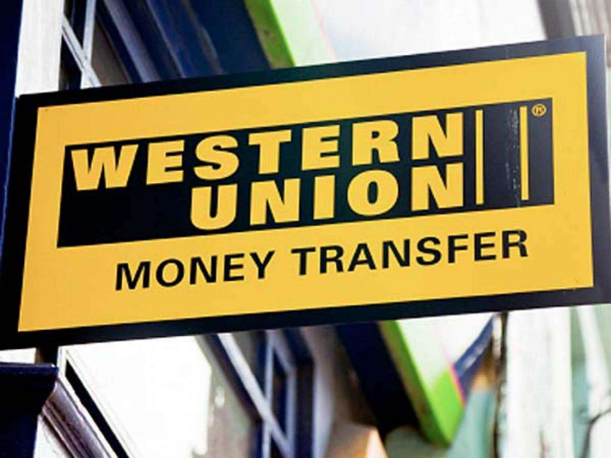 Денежные переводы вестерн. Western Union. Платежная система West Union. Вестерн Юнион логотип. Western Union фото.
