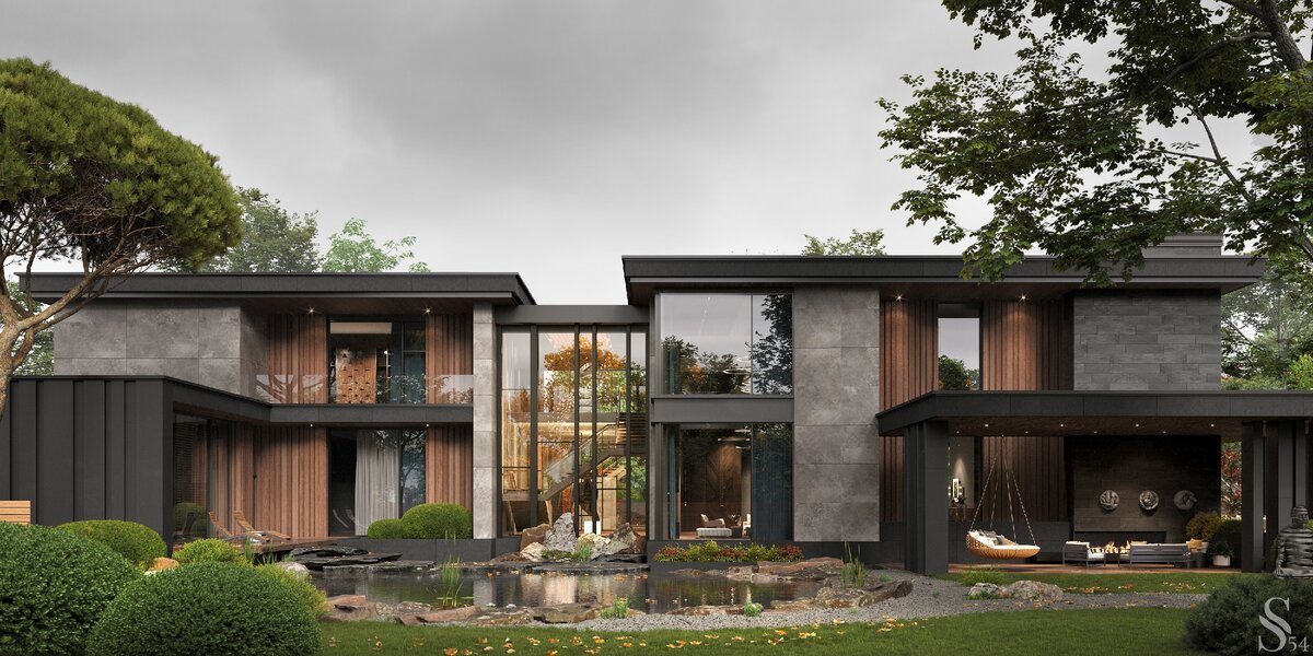 Фасад дома выполнен из термообработанного дерева, керамогранита и металла