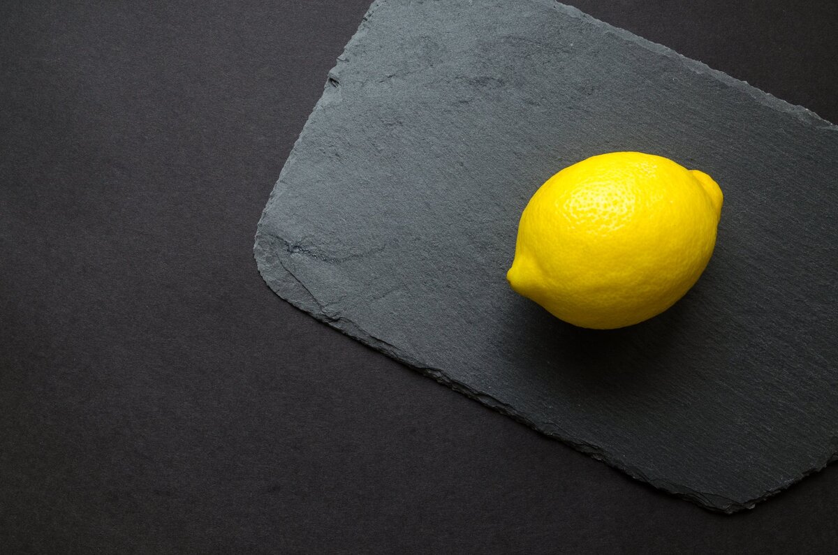https://www.pexels.com/photo/photo-of-yellow-lemon-on-gray-surface-952365/