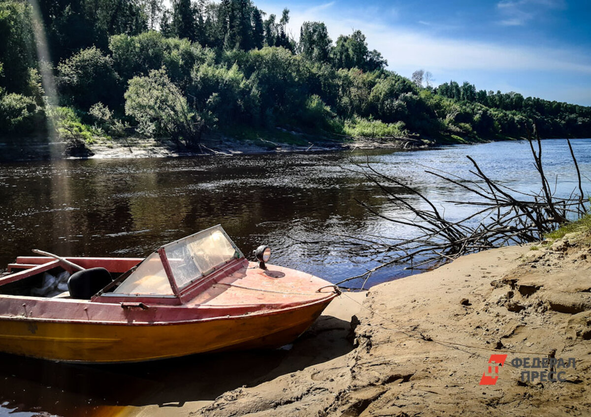 В результате непогоды на Волге перевернулась моторная лодка.  Фото: ФедералПресс / Дарья Сеймовская