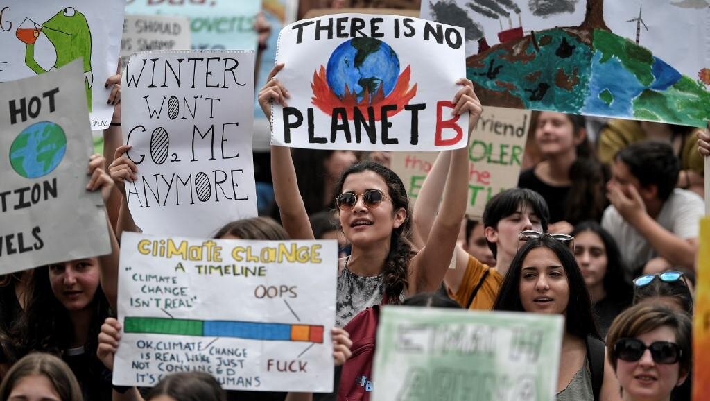 Демонстрация  перед зданием парламента Греции в Афинах 24 мая 2019 года. Луиза ГУЛИАМАКИ / AFP