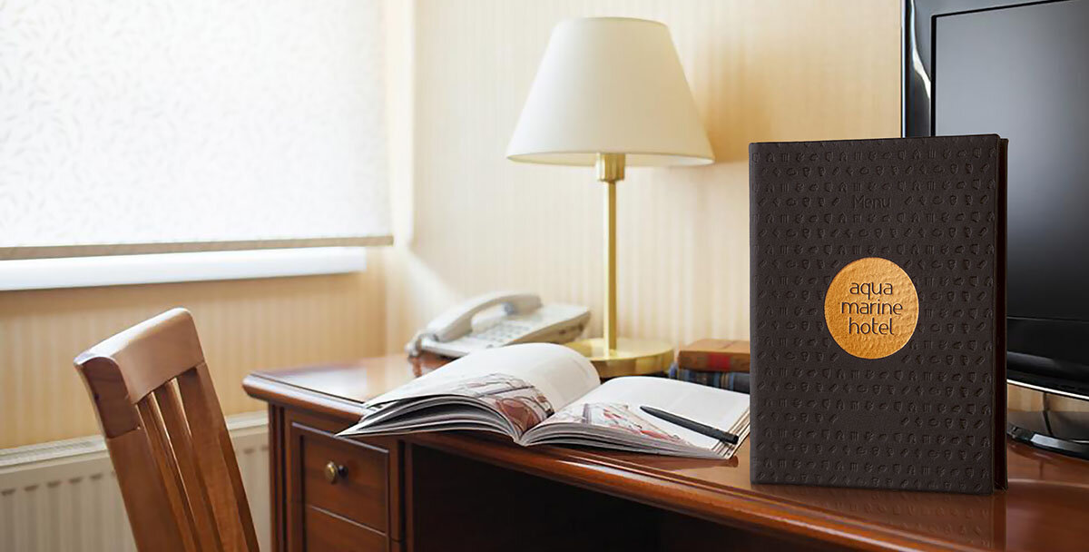 Тиснение логотипа + блинтовое тиснение патерна во всю область обложки