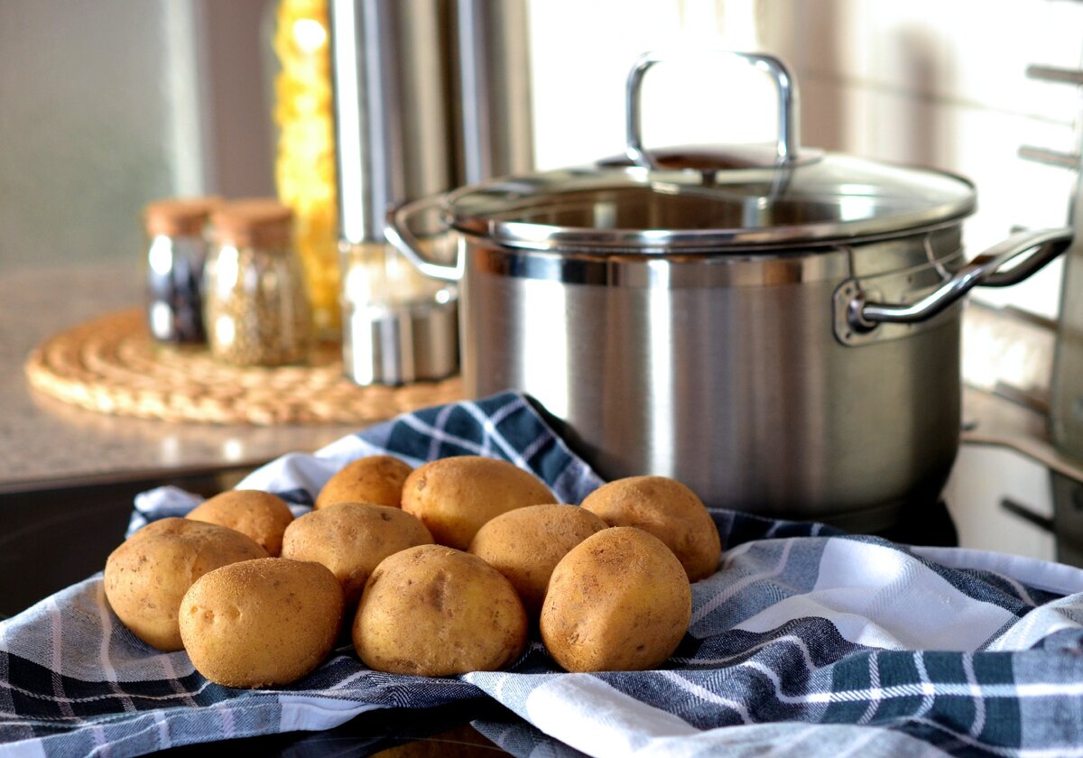 https://www.pexels.com/photo/potatoes-beside-stainless-steel-cooking-pot-45247/