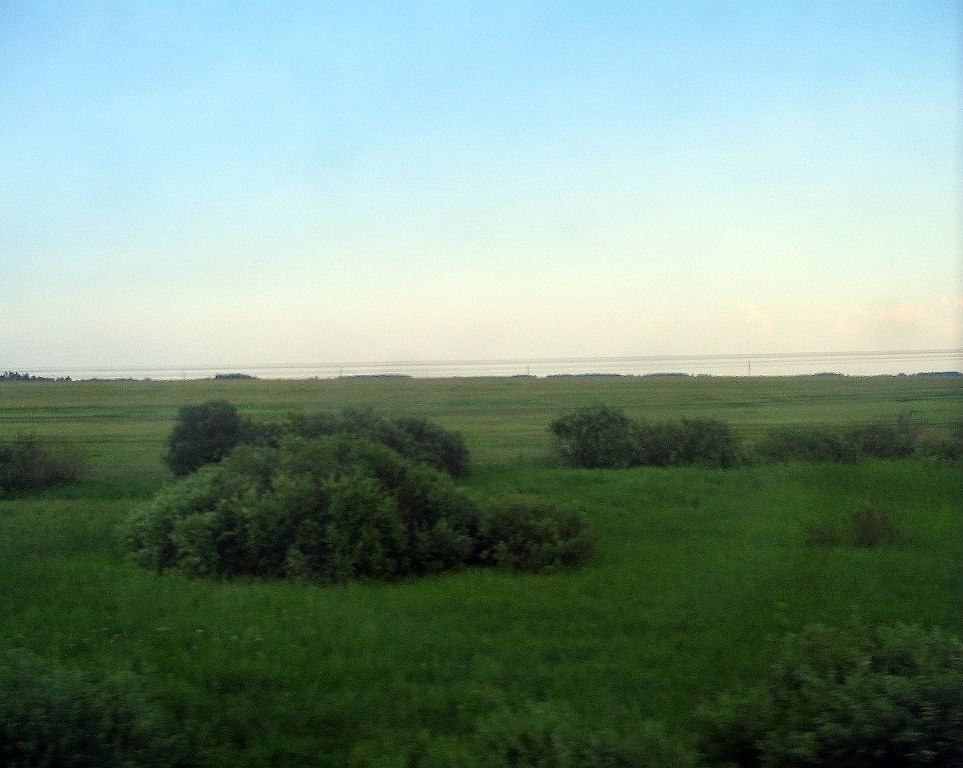 https://upload.wikimedia.org/wikipedia/commons/thumb/8/86/Siberian_plain.jpg/963px-Siberian_plain.jpg