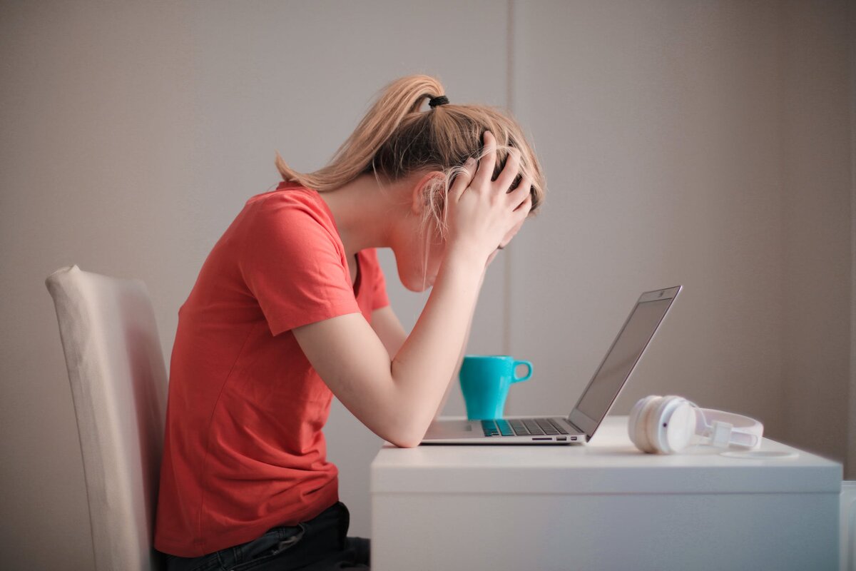 https://www.pexels.com/photo/woman-in-red-t-shirt-looking-at-her-laptop-3755761/