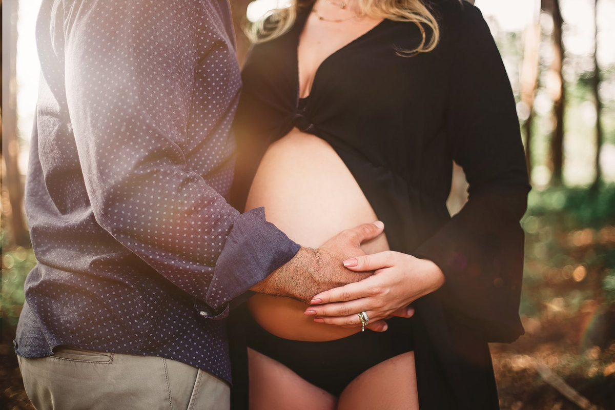 https://www.pexels.com/photo/man-touching-woman-s-baby-bump-2168824/