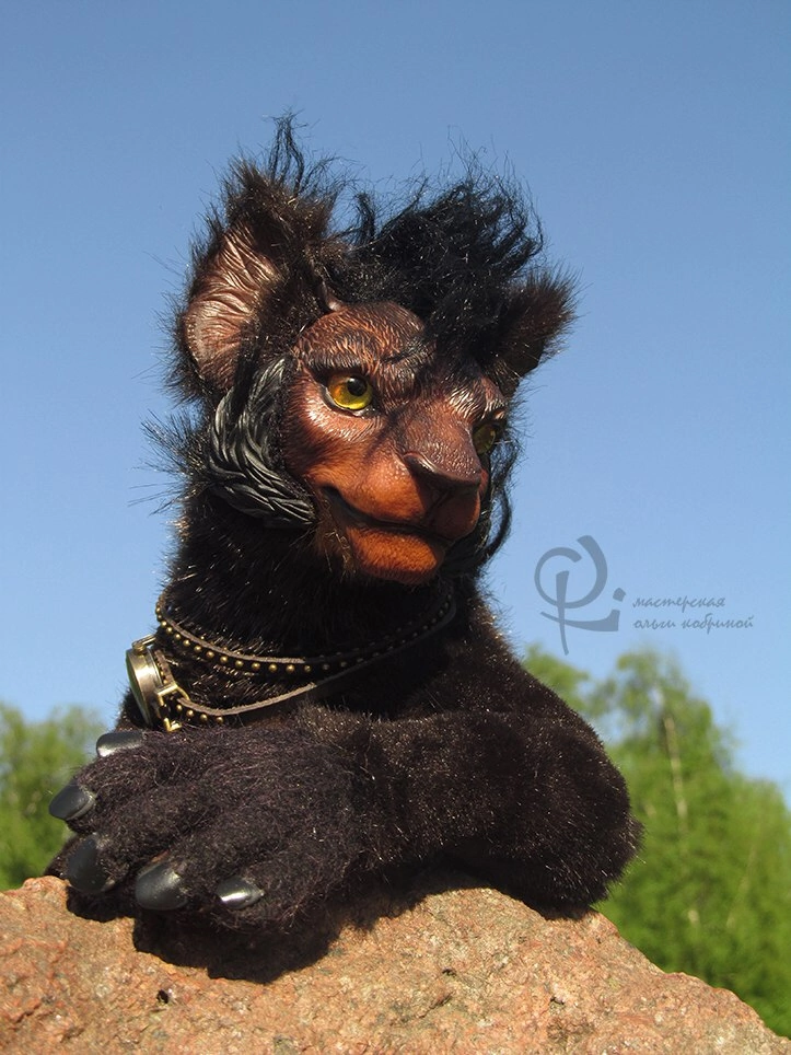 Я вижу в нём черты льва, обезьяны и немного человека…