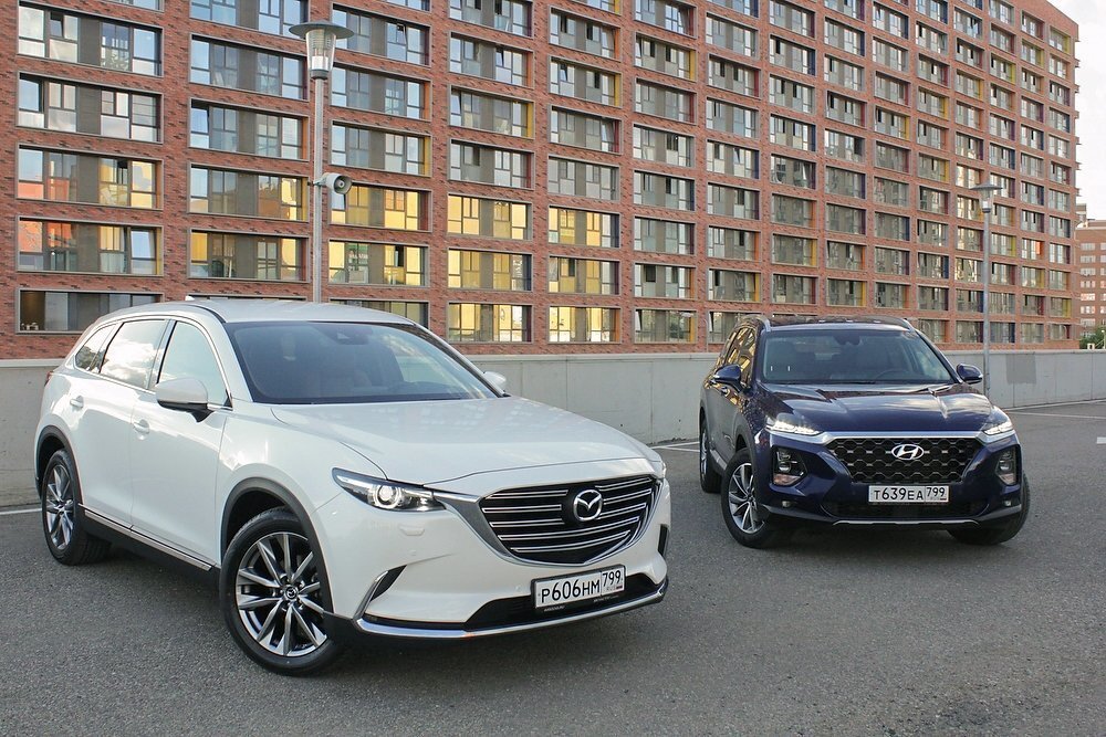  Что важнее - размер машины или мощность мотора? Внутреннее убранство или поведение на дороге? Багажник или экономичность? А если и то, и другое, и даже пятое - что же тогда с ценой? Наконец, нужен все-таки семиместный вариант салона семье из пяти человек или нет? Во всем этом мы разбирались, сравнивая Mazda CX-9 и Hyundai Santa Fe.Фото: Руслан Антипов / РГКак снаружи