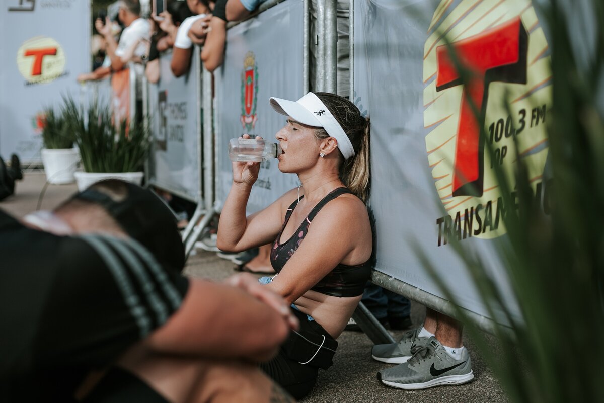 https://www.pexels.com/photo/woman-in-black-crop-top-sitting-and-drinking-water-2282590/