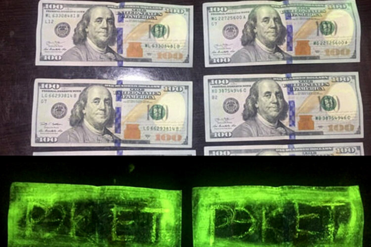 Изъятые меченые купюры. Фото из Facebook Следственного департамента МВД Узбекистана