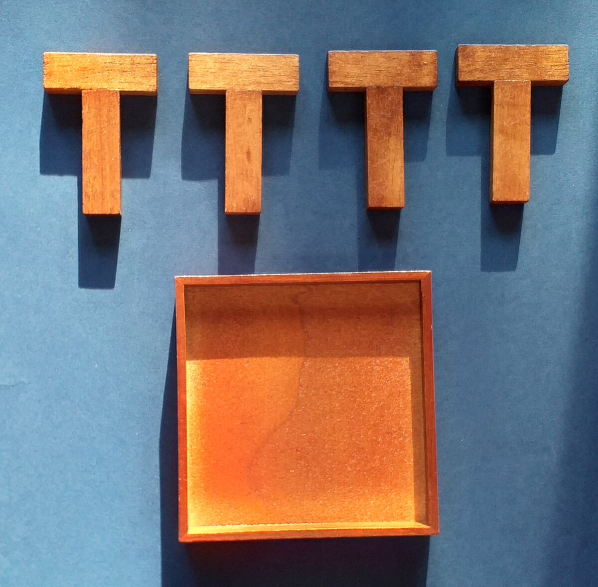 Головоломка "Четыре буквы Т"