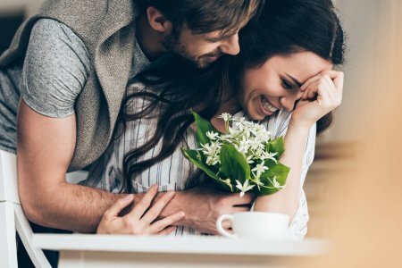 https://st3.depositphotos.com/9880800/15663/i/1600/depositphotos_156639698-stock-photo-young-couple-with-flowers.jpg