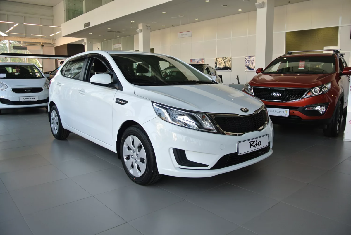 Сколько кию. Киа Рио с974ес72. Kia Rio 2015. Киа Рио pgu. Киа Рио т325ст71.