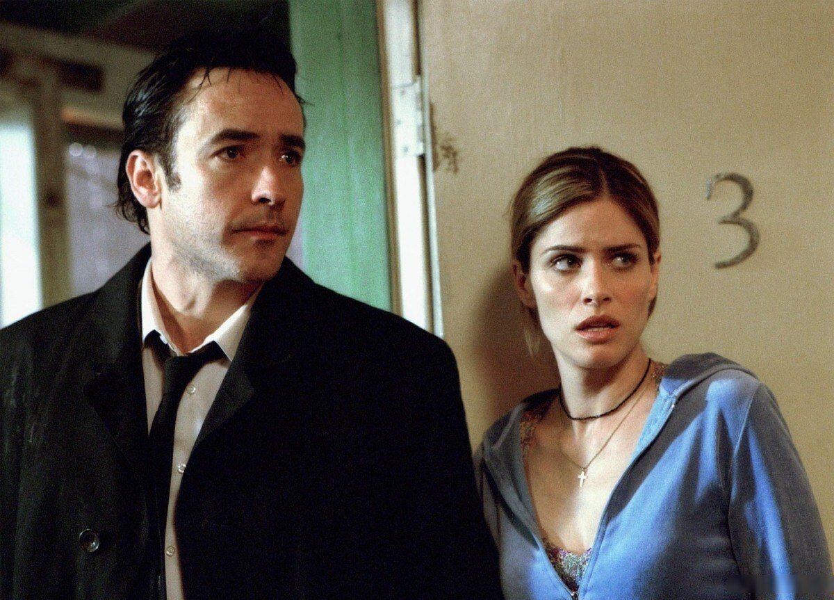 Джон Кьюсак и Аманда Пит в фильме «Идентификация»