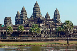 Angkor Wat Temple
Angkor Wat “Temple City” is the famous 7th Wonders of the World, designated by UNESCO as a world heritage site in 1992. Angkor is one of the most important archaeological sites in South-East Asia. Stretching over some 400 km2, including forested area, Angkor Archaeological Park contains the magnificent remains of the different capitals of the Khmer Empire, and is the largest religious monument in the world as well as the soul of Cambodia. The temple was built in the early 12th century under the reign of King Suryavarman II, was originally constructed as a Hindu temple for the Khmer Empire, gradually transforming into a Buddhist temple toward the end of the 12th century. Angkor Wat combines two basic plans of Khmer temple architecture: the temple-mountain and the later galleried temple. It is designed to represent Mount Meru, home of the Devas in Hindu mythology: within a moat and an outer wall 3.6 kilometers long are three rectangular galleries, each raised above the next. At the center of the temple stands a quincunx of towers with 65m high.