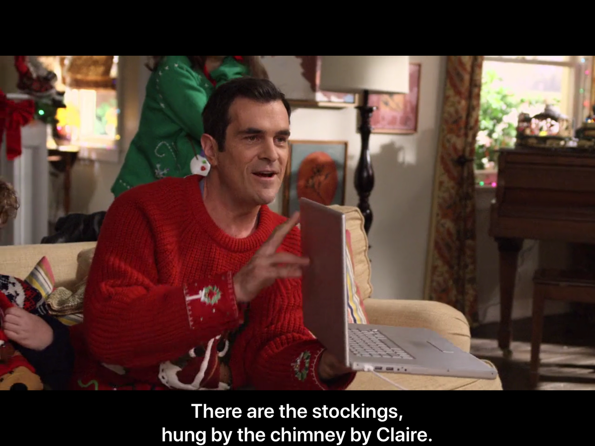 *Клер развесила праздничные носки на камине 