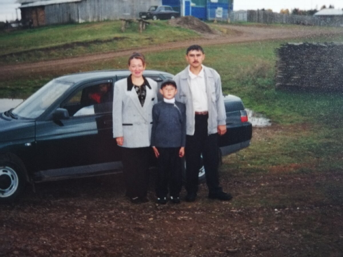 Это я в детстве с родителями