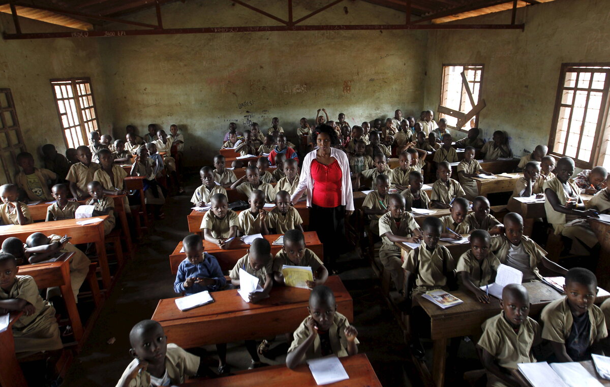https://www.businessinsider.in/photo/51445743/inside-the-worlds-unhappiest-country/A-teacher-leads-a-class-session-at-the-ecole-primaire-Ave-Marie-in-Burundis-capital-Bujumbura-April-24-2015-.jpg