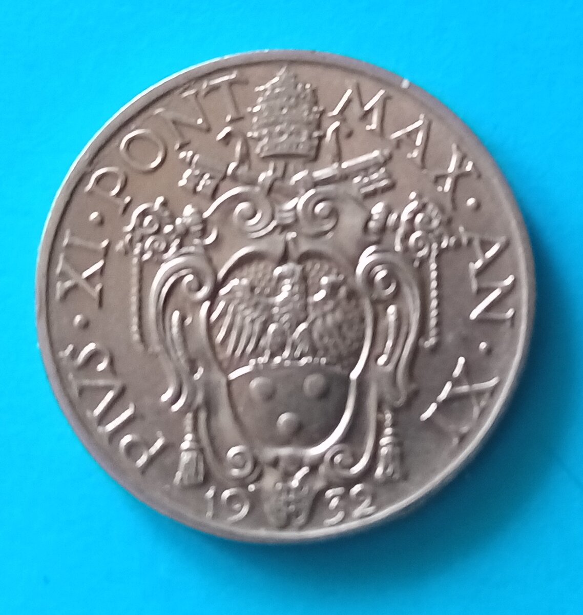 Монета 20 чентезимо 1932 года . На аверсе надпись Пий XI.