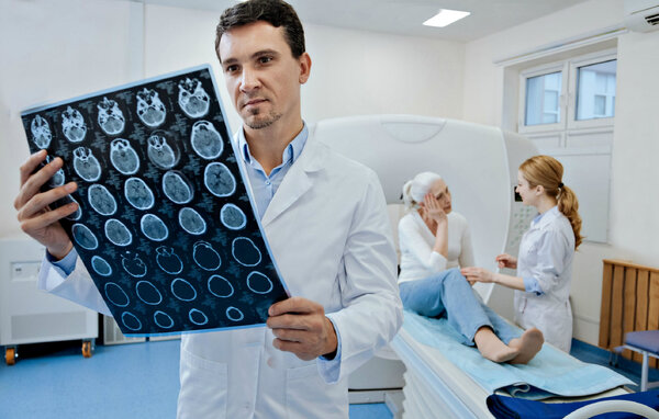 Схематичное изображение принципа работы МРТ