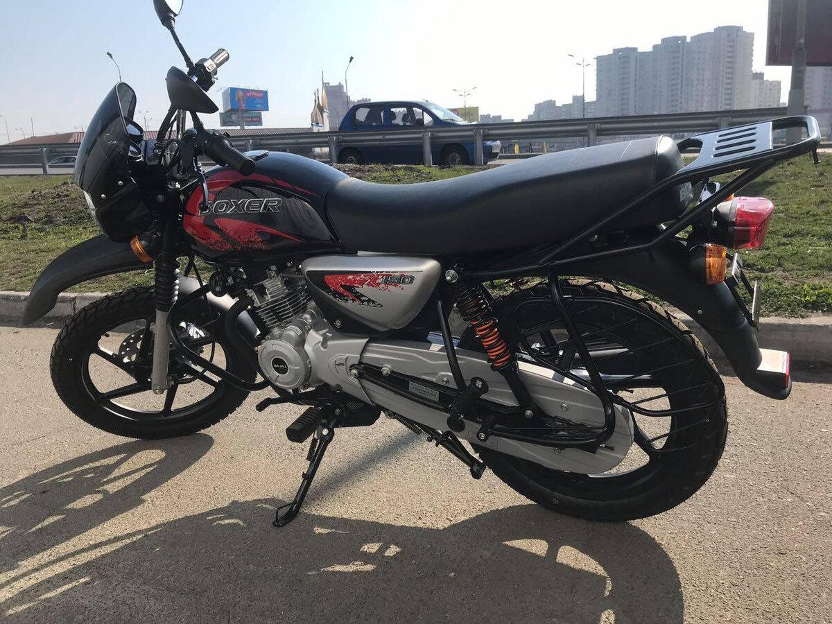 Индийский мотоцикл  Bajaj Boxer BM 150X за свои деньги достаточно качественный.