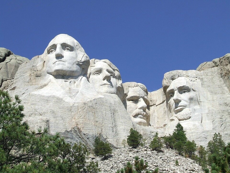 Photo from https://cdn.pixabay.com/photo/2015/04/11/18/11/mount-rushmore-718028_960_720.jpg